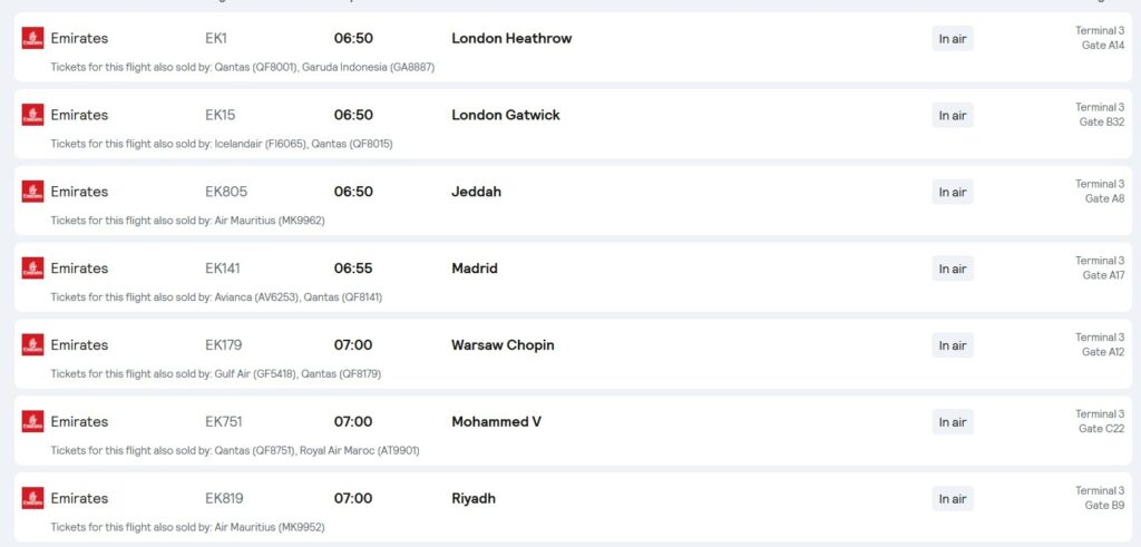Dubai International Airport live flight status showing Emirates departures to London Heathrow, Gatwick and other international destinations